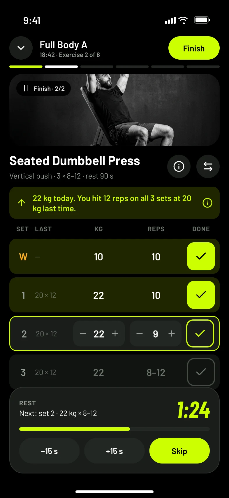 HeroForm workout screen with coached sets for Seated Dumbbell Press